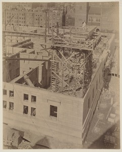 Mock-up of cornice on scaffolding, construction of the McKim Building.