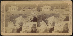 The bullet scarred American legation, from barricaded City Wall - forbidden city and coal mountain in distance - Peking, China